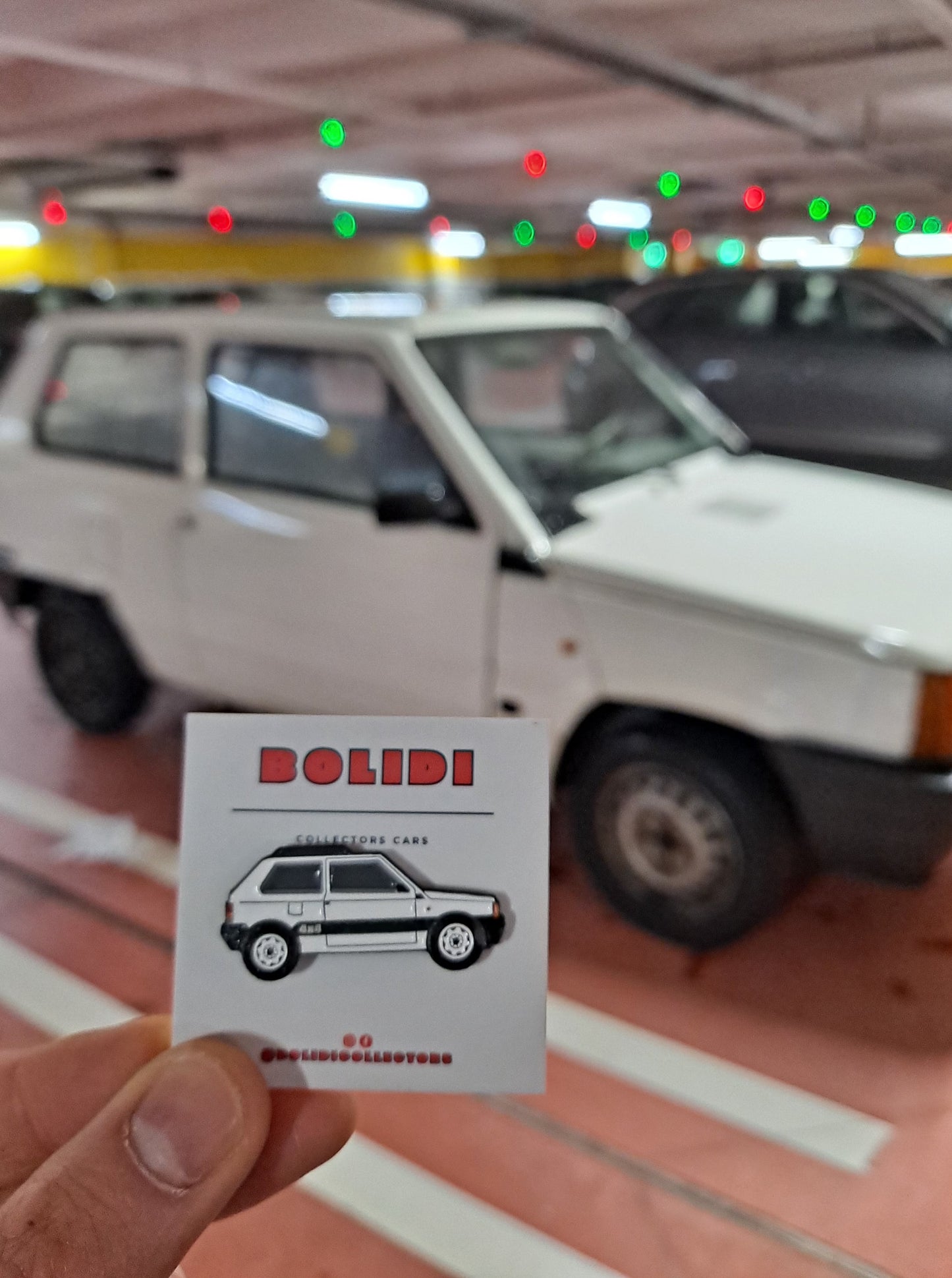 Fiat Panda 4x4 white in a parking space