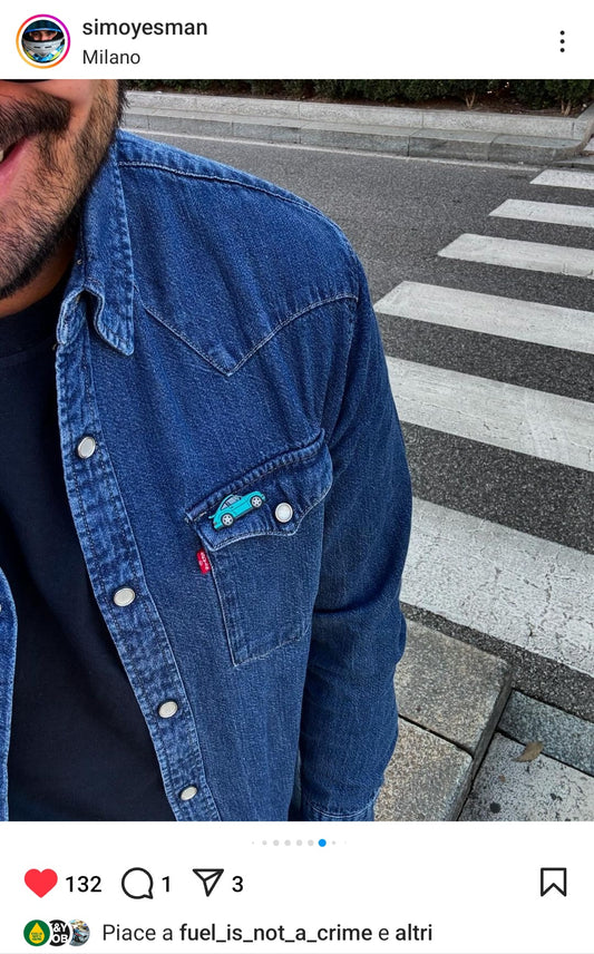 Simone Redaelli DriveUp Mediaset Simoyesman wearing a porsche 911 pin around Milan Italy